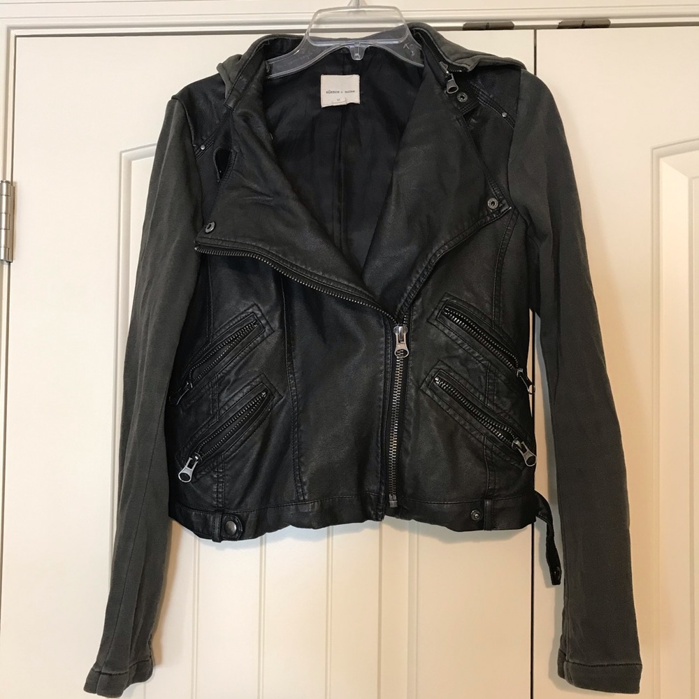 Leather jacket with sweatshirt sleeves